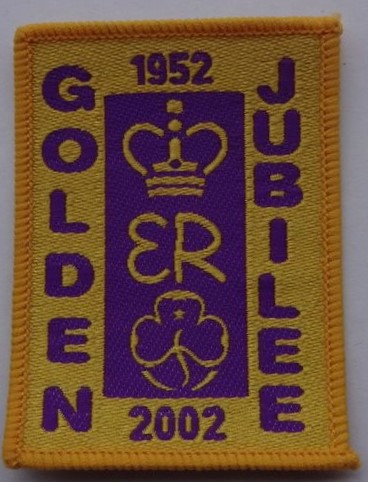 Golden Jubilee 2022 badge for Queen Elizabeth II's jubilee, in purple on gold background.