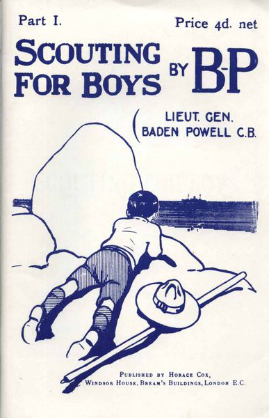 Image of the book "Scouting for Boys" part 1 by Robert Baden-Powell showing a young boy lying prone hiding behind a rock, in Scout uniform.