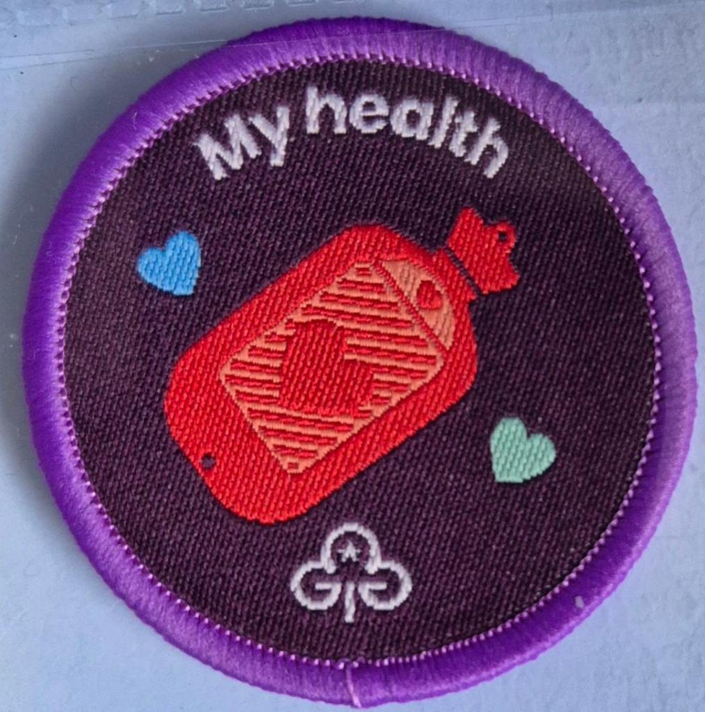 Ranger My Health badge, purple binding.  Hot water bottle logo.